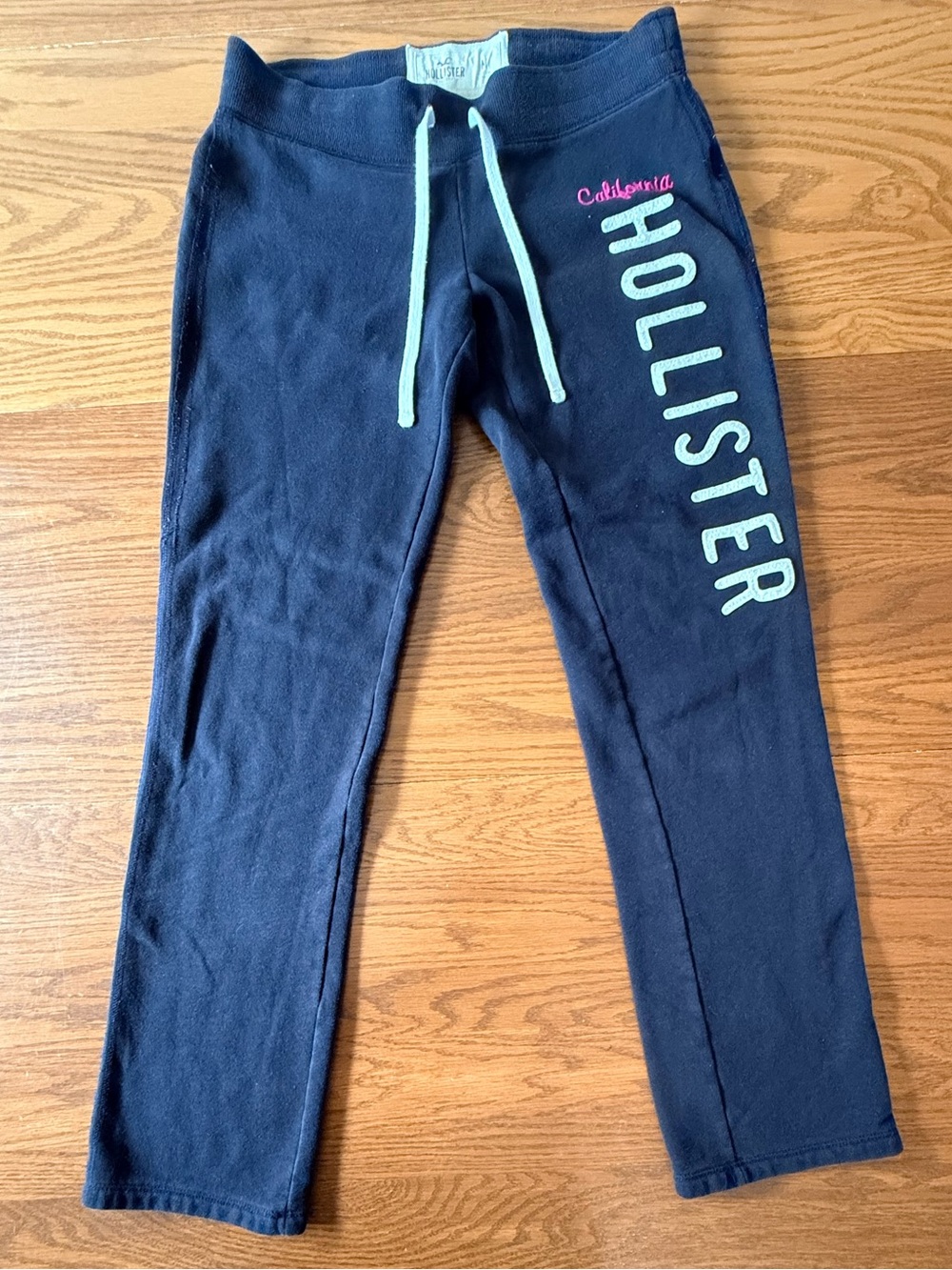 Hollister Low rise black Sweatpants with white Drawstring and logo down leg